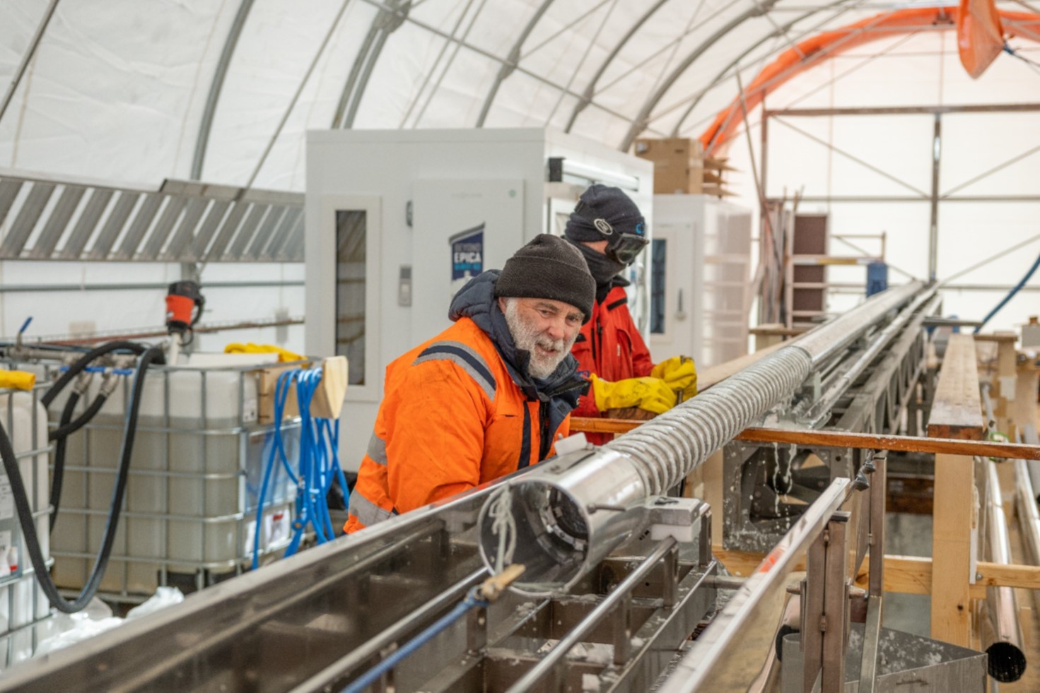 Martin and Robert extracting the core barrel from the main barrel of the drill. In the background, to the left, is one of the two 1000 liter containers for handling the drill fluid – we’ll look more at how the fluid is handled and recovered from the drill in the next couple of days.